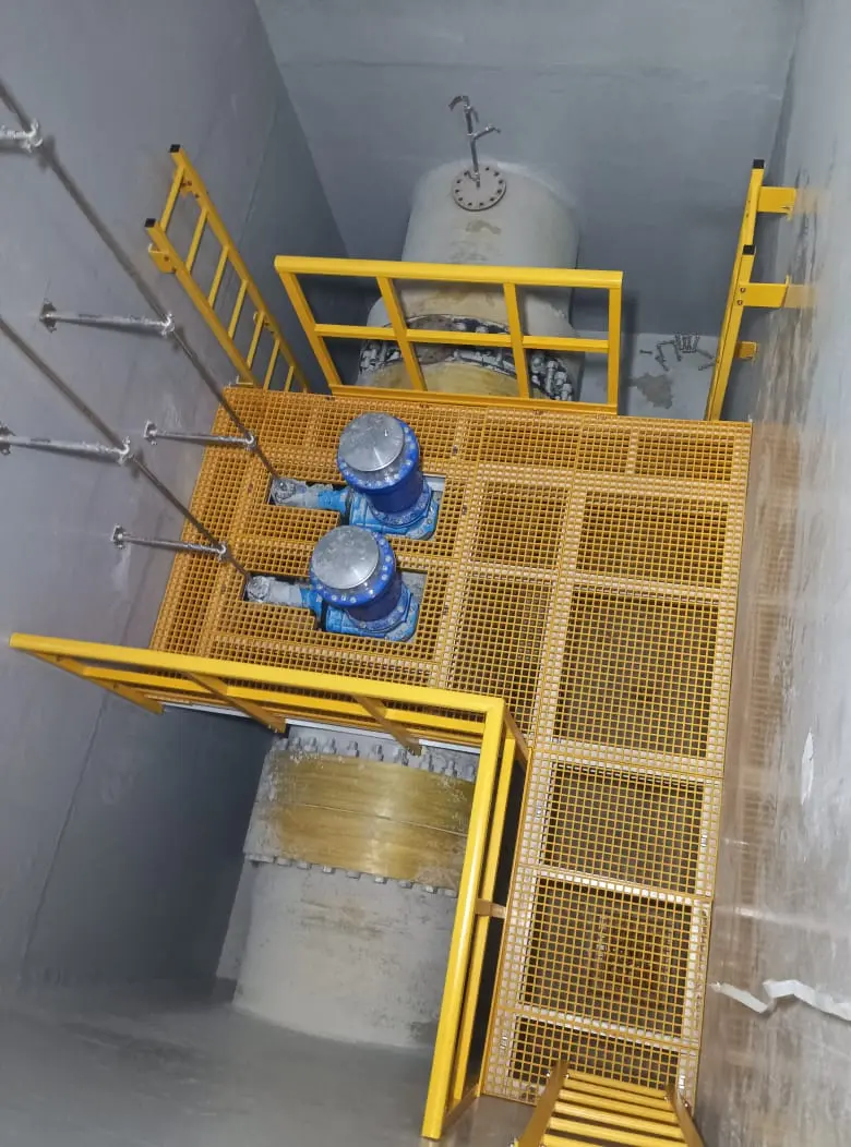 top view of FRP grating platform installed over industrial pipeline chamber