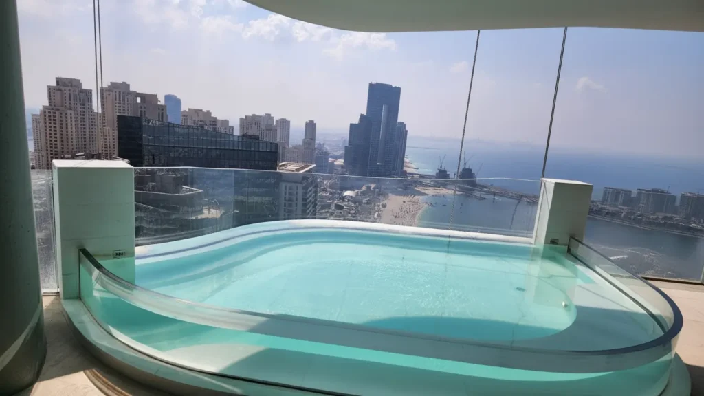 GRP fiberglass swimming pool installed on rooftop with city view